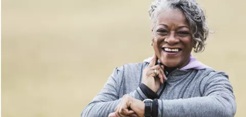 African American Senior Citizen Woman Checking Pulse