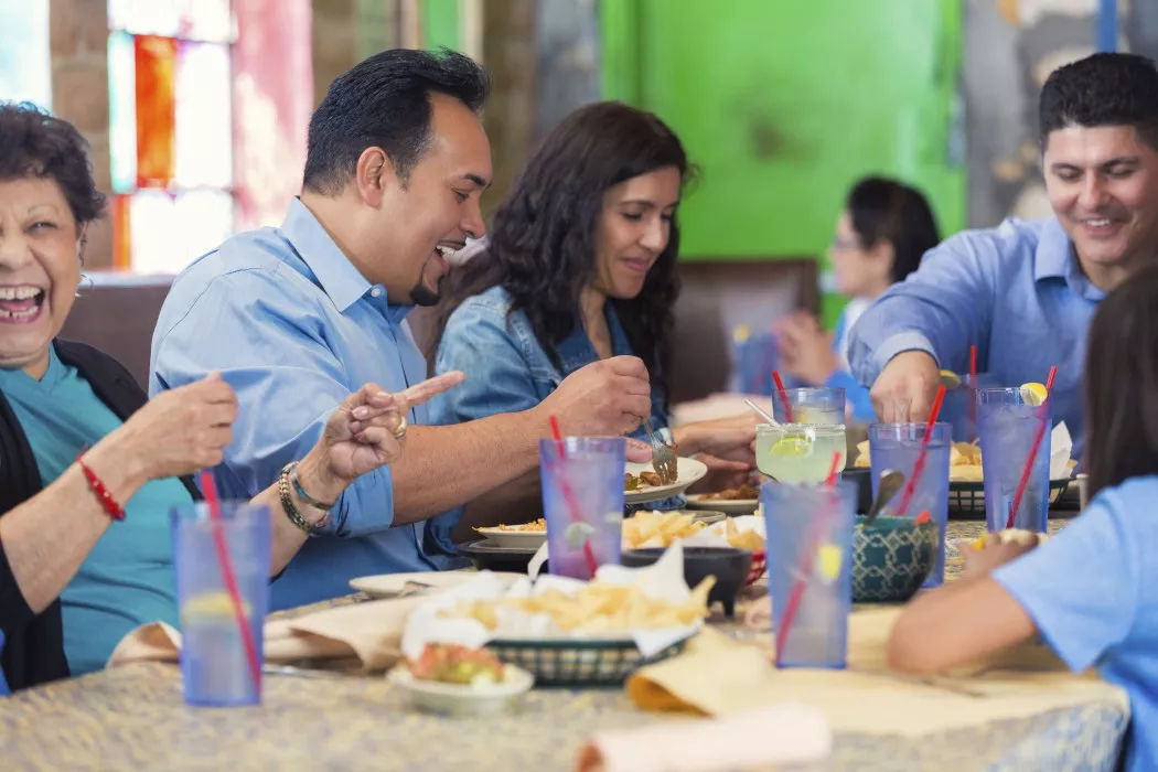 Family eating dinner at a restaurant.