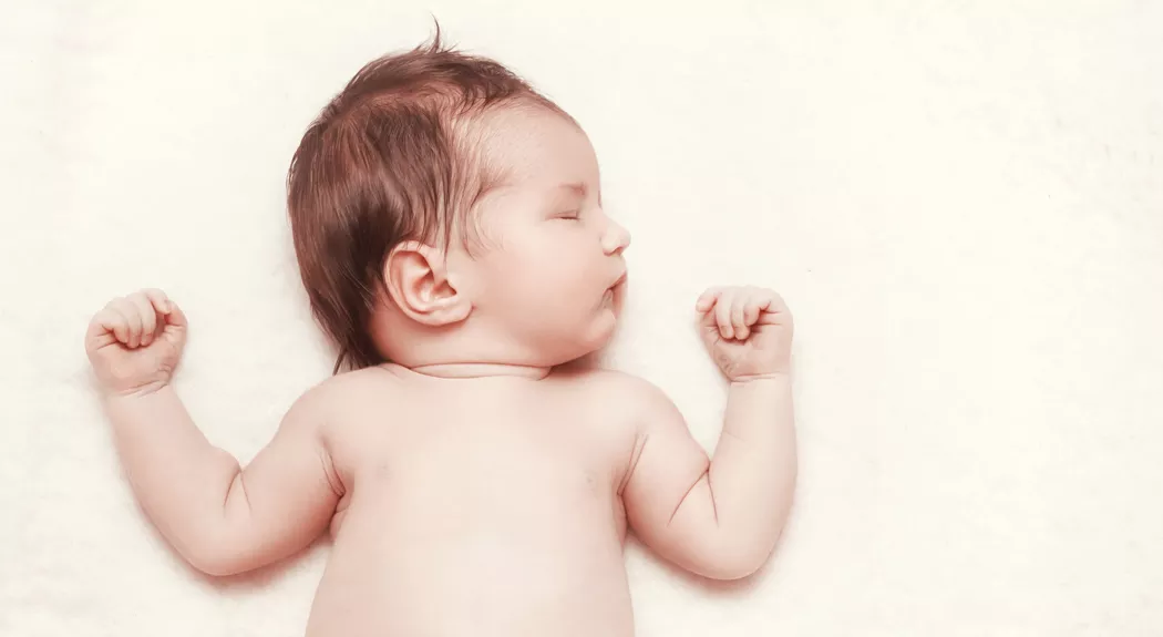 Newborn baby sleeps. Child’s portrait