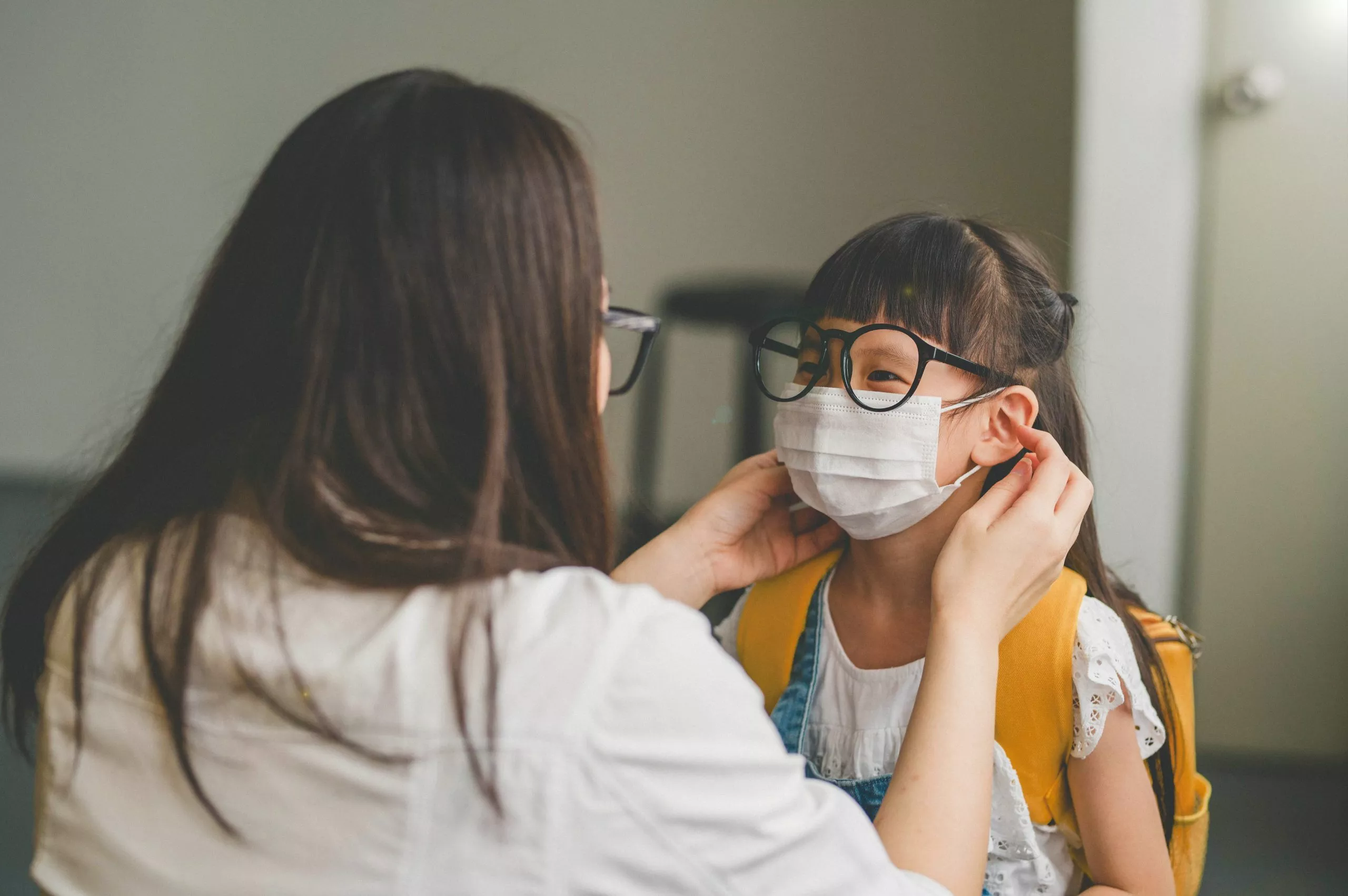 Helping a student adjust their mask