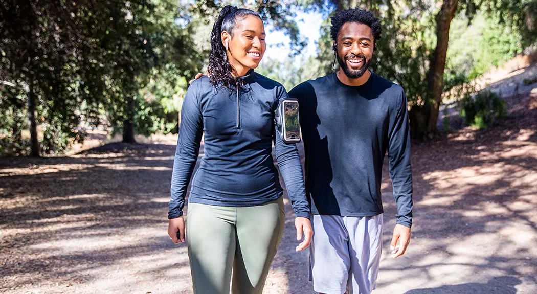 diverse couple walking outside