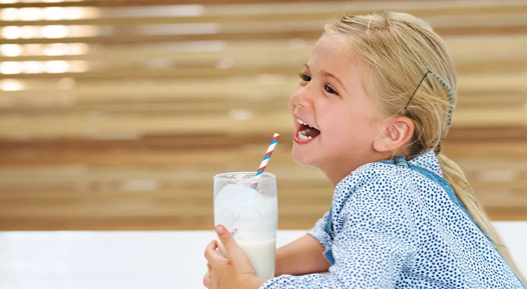 girl drinking milk