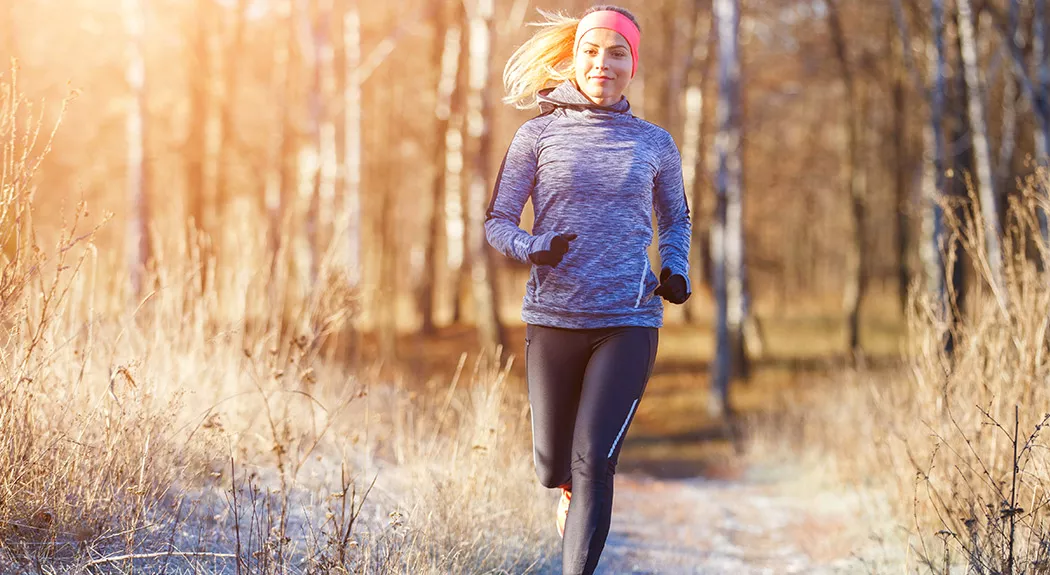 woman running on cold winter day