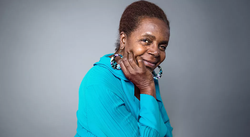 Older African-American lady with hand on her chin